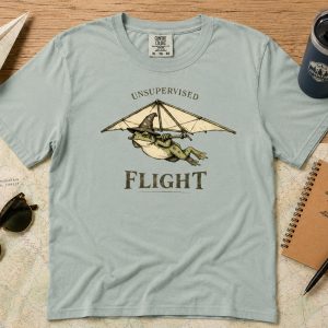 Unsupervised Flight Funny Frog Hang Gliding Graphic T-Shirt
